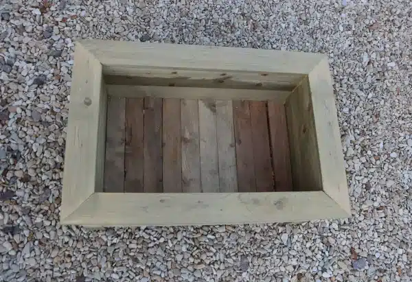 Timber garden planter in rustic rough sawn treated soft wood.