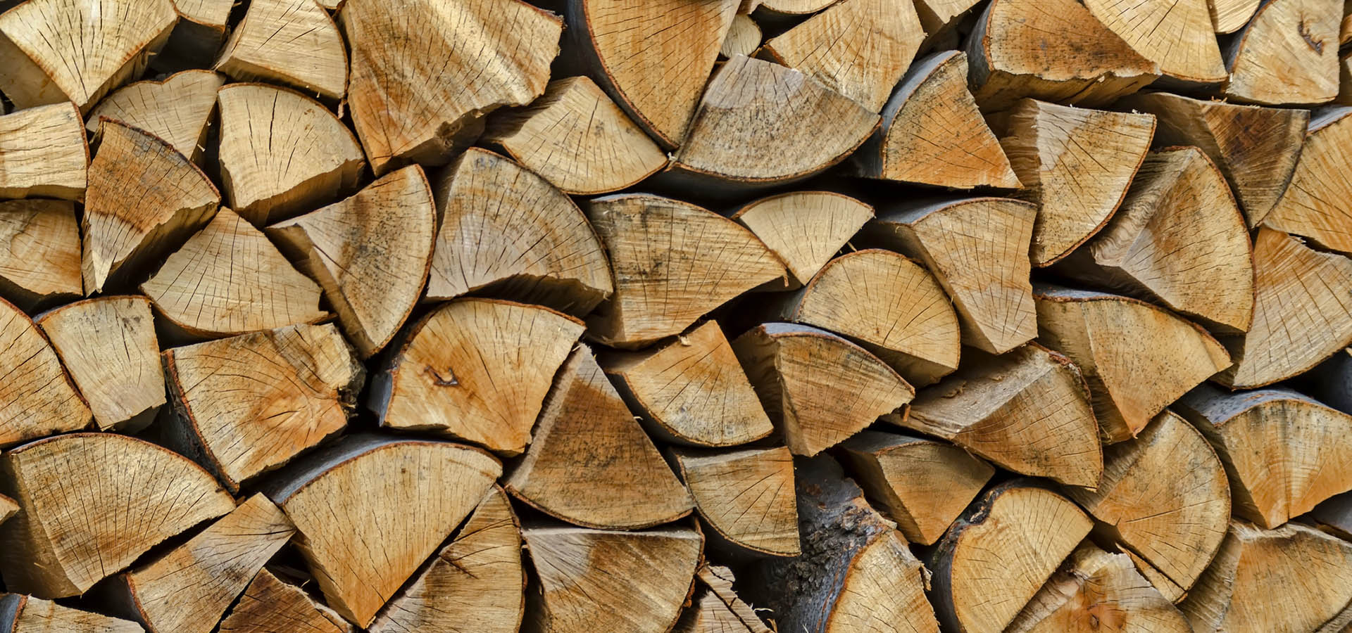 Pile of chopped firewood prepared for winter