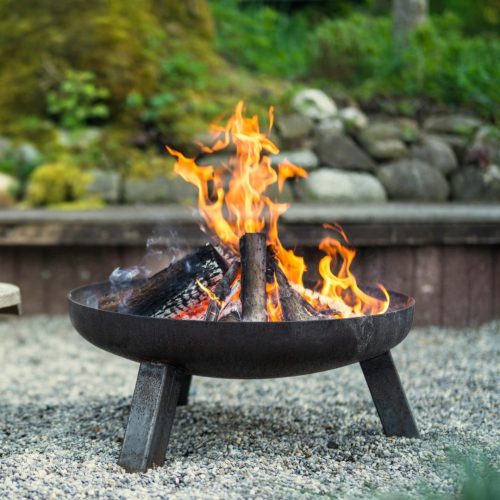firepitinstagram Fire pit burning wooden logs outside