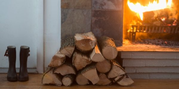 twitterash14112018 Firewood pile next to a burning fireplace